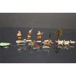 1920's cold painted lead figures, a fox, rabbit , dog, deer, sled and trees.