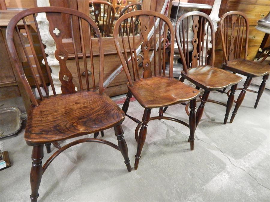 A matching set of four Lincolnshire windsor side chairs , circa 1815 , each signed " WILSON GRANTHAM