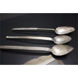 Three Hanging Metal Spoons