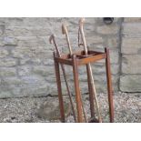 Umbrella / Walking Stick Stand lacking bottom tray and three walking sticks