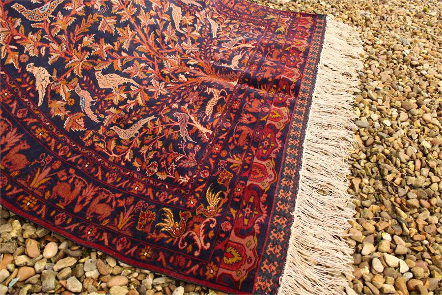 A mid 20th century afghan, tribal silk and wool on silk rug, dated 1361 in the Farsi calendar a very - Image 9 of 12