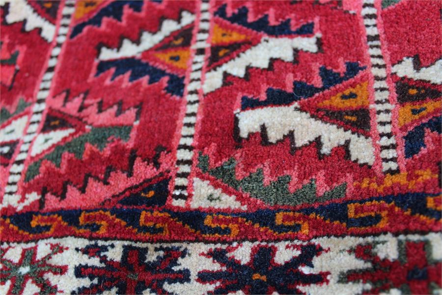 A pair of fine quality Mid 19th century turkoman yamut, very fine weave torbas;in rich red and - Image 7 of 14