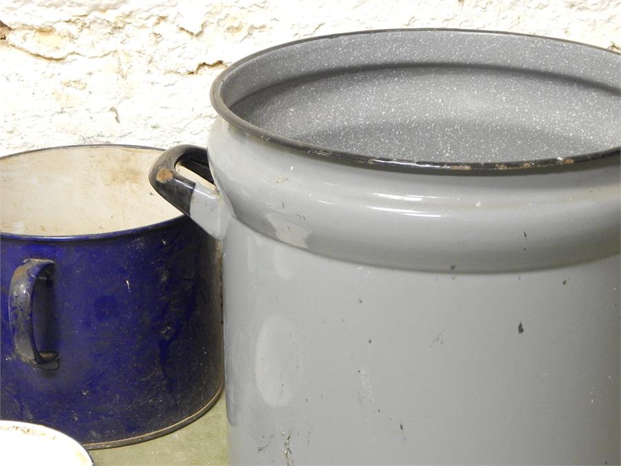 A selection of enamel pots / planters, trays and a pan.