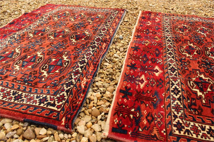 A pair of fine quality Mid 19th century turkoman, very fine weave torba rugs; both approximately