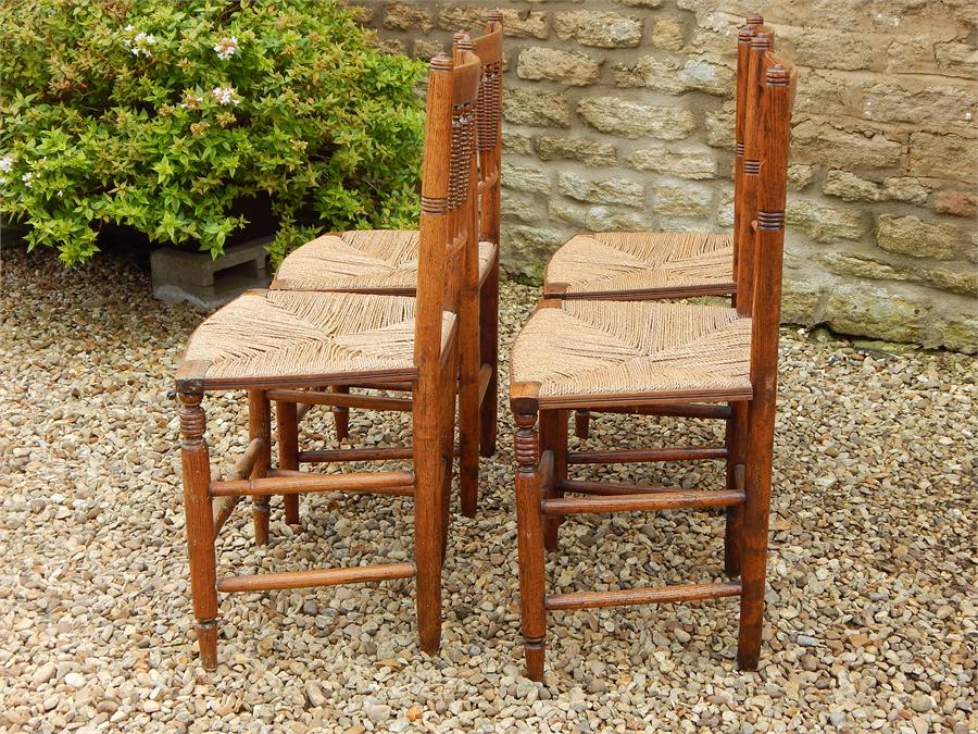 A Set of Four Matching Elm Country Kitchen Rush Seated Side Chairs, turned spindle Backs in a fan - Image 10 of 12