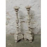 Pair of small stone-effect resin pricket candle stands (damage to top of one).