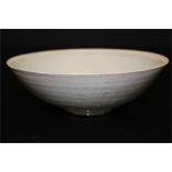 A CHINESE QINGBAI GLAZED BOWL, SONG DYNASTY (1127 - 1279) 16.5cm diameter 5.5cm high.