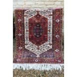 A Mid 20th century afghan Serai wool on wool rug, very fine weave; hand knotted in wool and silk,