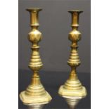 A Pair of 19th century Brass Candlesticks with push-up rod ejectors