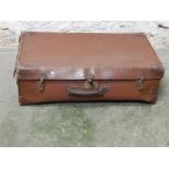 Vintage suitcase with a number of "hobbie"s pamphlets inside
