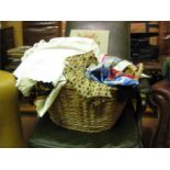 Wicker basket containing misc vintage scarves,gloves and apron etc..