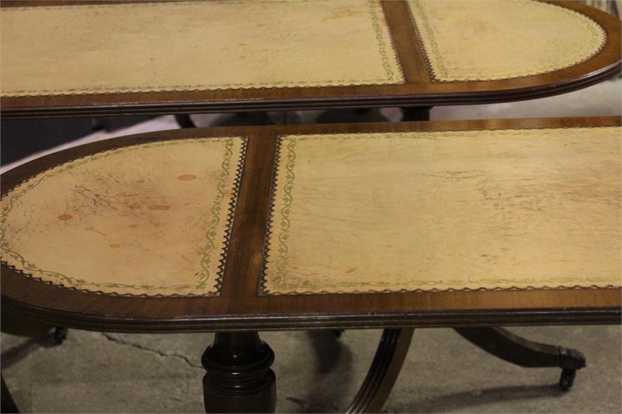 A Pair of Modern leather topped pedestal coffee tables, with brass paw castors (one foot detached on - Image 2 of 4