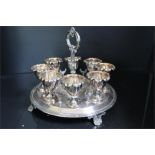 Second quarter 19th century sheffield or silver plate egg cup holder with eight eggcups on stub