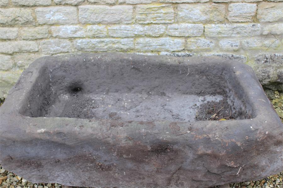 A Large stone trough garden planter, previously from a farm in Yorkshire, measuring approximately: