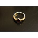 Small oval smooth garnet 9ct gold ring