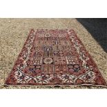 A Persian rug / carpet - Measures: