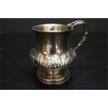 An early 19th century George iV Regency Large Silver foliage Embossed Tankard baluster form.