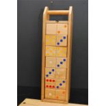 wooden dice in wooden case