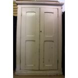 An impressive very large painted pine estate cupboard in old paint - rounded corners. 212cm x 134 cm