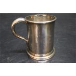 A Small Plain White metal Tankard of tapering form. Weight: 208g E.Taylor maker Sheffield stamp to