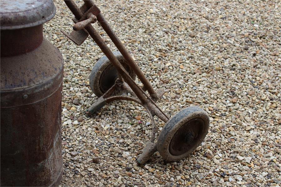 vintage metal milk churn with lid on a metal trolley - Image 2 of 4