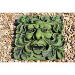 Weatherproof stone effect green man square in shape.