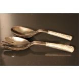 white metal handled salad servers - possibly chinese