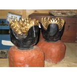 A pair of industrial well drilling heads mounted as gate finials. NOTE - one loose from base. The