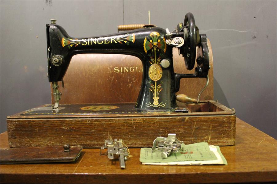 A Singer Sewing machine with colourful decoration - cased - No. Y652091