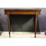 A regency period patinated mahogany foldover card table on turned supports - D-Shape - Rosewood