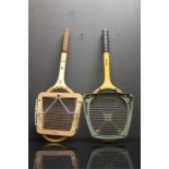 Two wooden Vintage tennis raquets with keepers. A slazenger Victory and an Olympia Mitrexa.