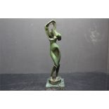 After Alexander Archipenko, a cubist abstract statue of female form, possibly marbled bronze -