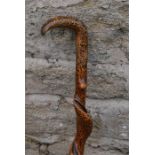 A Very decorative twisted walking stick with spotted lacquer painted decoration.