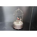 musical wind-up birdcage