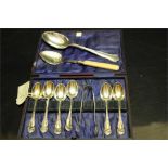 A cased set of Old Sheffield plate teaspoon set and sugar tongs - J.Deakin along with two other