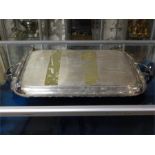 Silver plate twin handled tray on feet. 63cm (inc handles) by 38cm