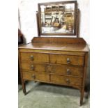 oak vintage dressing table chest with drawers and a rectangular mirror