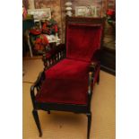 19th century armchair covered in red material .19th century piano stool with lifting seat covered in