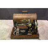 A singer sewing machine in case - No. 13645384