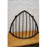 Cast iron corner hay feeder.