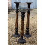 Pair wood and black painted candlesticks, plus another smaller.