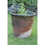 Weathered terracotta circular pot / planter.