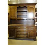Oak dresser 20th century in 18th century style. Good quality utilitarian practical piece of