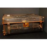 A canvas and leather trunk labelled inside " made at the society works " Army and Navy Co-