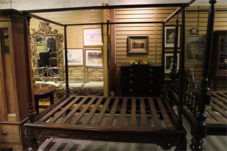 A Carved Four Poster bed. 7ft by 65" wide, 79" high, mattress base height 19 1/2", would suit 62"