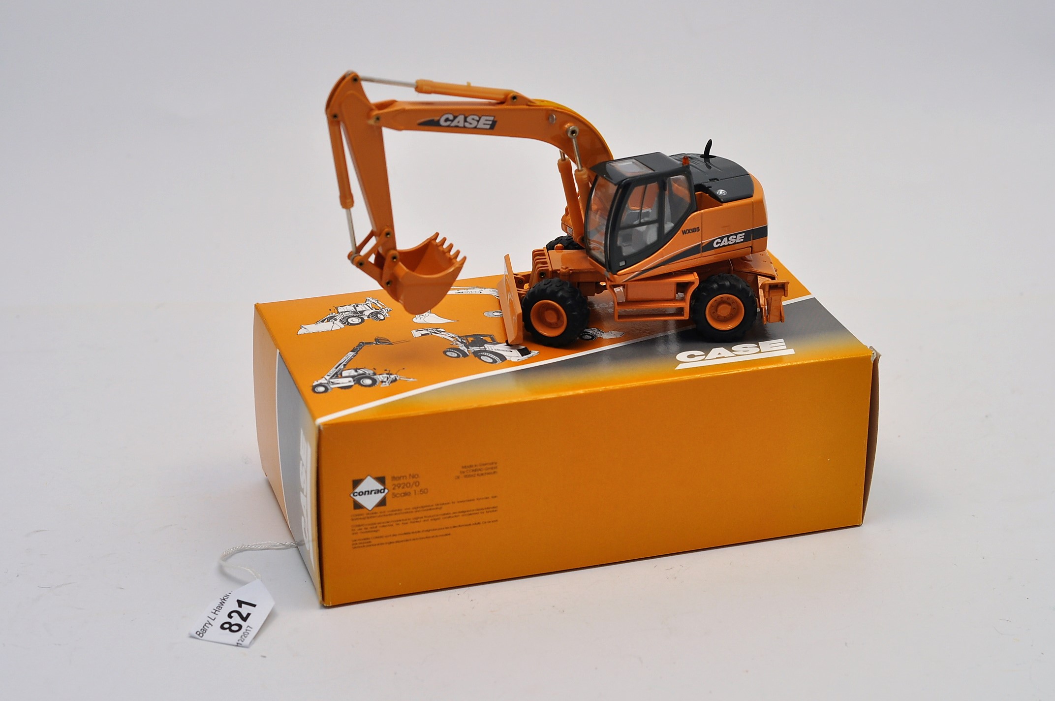 CONRAD 1:50 SCALE CASE WX 185 WHEELED EXCAVATOR WITH BOX