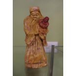 Oriental soapstone figure of a man & child 17.5cm high