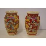 Pair of antique Japanese Satsuma vases decorated with male figures and a mountain background, 26cm