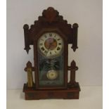 Antique American Waterbury mantle clock with a 8 day striking movement, A, Saunders Sydney branded