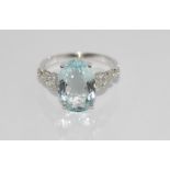 18ct white gold, aquamarine and diamond ring weight: approx 2.5 grams, size: approx N/6-7